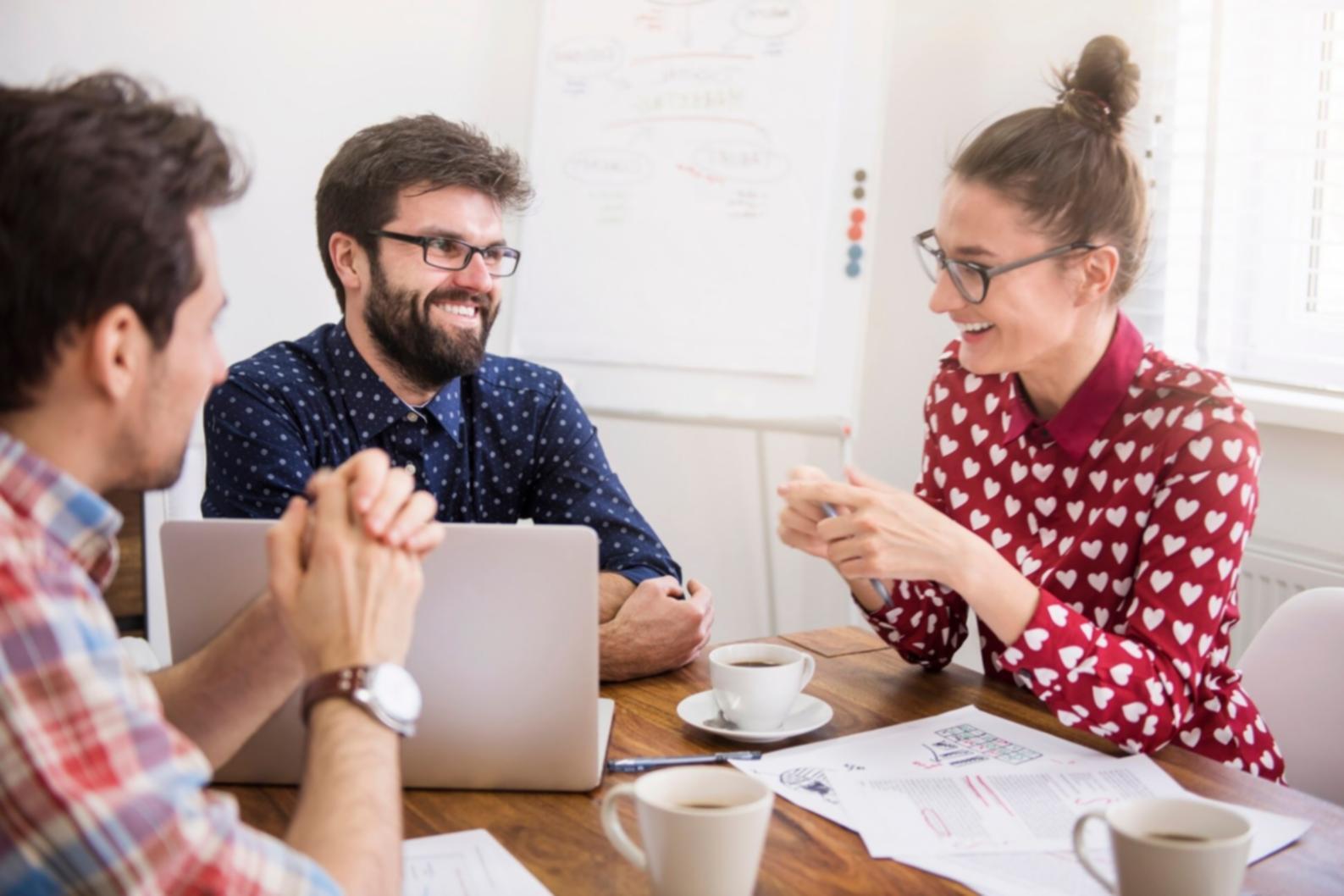 Professional budget planning and negotiation materials on desk